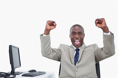 simsearch:400-05900712,k - Victorious salesman with the fists up against a white background Stock Photo - Budget Royalty-Free & Subscription, Code: 400-06627050