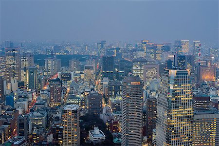 stockarch (artist) - View of the sprawling metropolis of Tokyo, Japan at dusk with illuminated tall modern skyscrapers and buildings Stock Photo - Budget Royalty-Free & Subscription, Code: 400-06628735