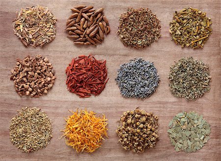 Medicinal herb selection also used in magical potions over papyrus background. Stock Photo - Budget Royalty-Free & Subscription, Code: 400-06629463