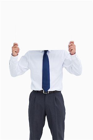 employee hold a sign - Tradesman holding blank sign in front of his head against a white background Stock Photo - Budget Royalty-Free & Subscription, Code: 400-06634164