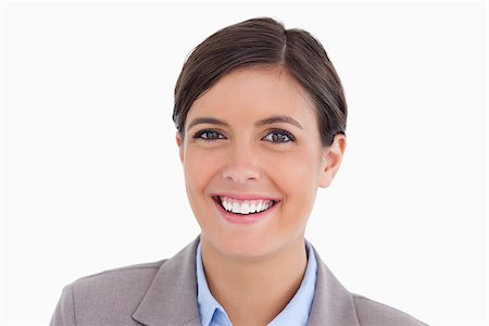 simsearch:400-06633122,k - Close up of smiling young entrepreneur against a whitebackground Stock Photo - Budget Royalty-Free & Subscription, Code: 400-06634203