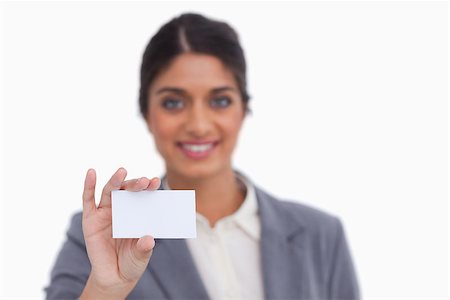 simsearch:400-06633122,k - Smiling female entrepreneur showing her business card against a white background Stock Photo - Budget Royalty-Free & Subscription, Code: 400-06634374