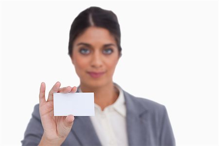 simsearch:400-06633122,k - Female entrepreneur showing her business card against a white background Stock Photo - Budget Royalty-Free & Subscription, Code: 400-06634373