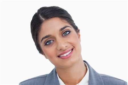 simsearch:400-06633122,k - Close up of smiling female entrepreneur against a white background Stock Photo - Budget Royalty-Free & Subscription, Code: 400-06634435