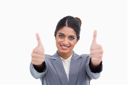 simsearch:400-05898224,k - Female entrepreneur giving thumbs up against a white background Foto de stock - Royalty-Free Super Valor e Assinatura, Número: 400-06634430