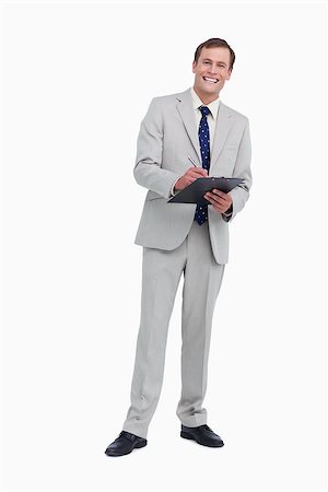 simsearch:400-06633122,k - Smiling businessman ready to take notes against a white background Stock Photo - Budget Royalty-Free & Subscription, Code: 400-06634804