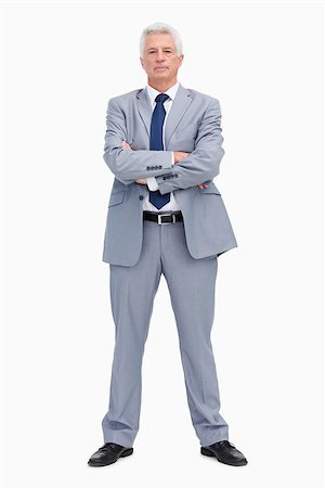 Portrait of a businessman with his arms folded against white background Stock Photo - Budget Royalty-Free & Subscription, Code: 400-06636172