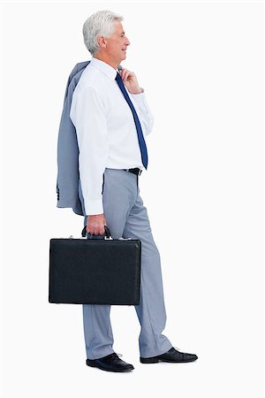 Profile of a cool businessman with a suitcase against white babckground Stock Photo - Budget Royalty-Free & Subscription, Code: 400-06636508