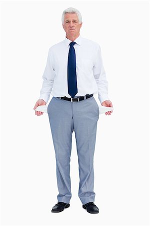 Portrait of a businessman with empty pockets against white babckground Stock Photo - Budget Royalty-Free & Subscription, Code: 400-06636509