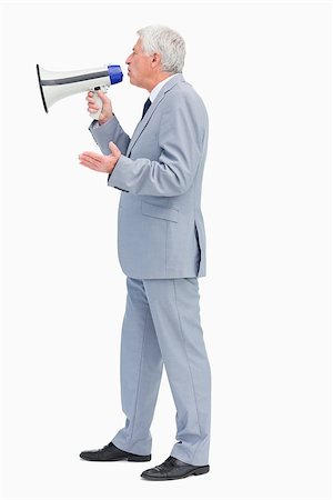 Profile of a businessman speaking with megaphone against white background Stock Photo - Budget Royalty-Free & Subscription, Code: 400-06636516