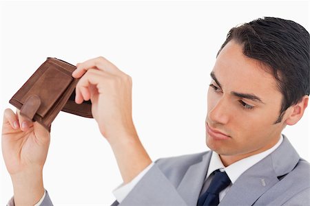 photographic portraits poor people - Man in a suit with his wallet empty against white background Stock Photo - Budget Royalty-Free & Subscription, Code: 400-06636759