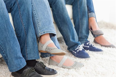 A side view of four pairs of feet and legs Stock Photo - Budget Royalty-Free & Subscription, Code: 400-06638263