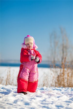 small child with snow in winter Stock Photo - Budget Royalty-Free & Subscription, Code: 400-06638623