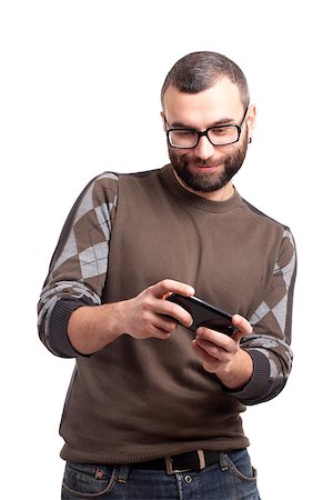 simsearch:400-06769983,k - Young man with beard playing games on smartphone Foto de stock - Royalty-Free Super Valor e Assinatura, Número: 400-06638800