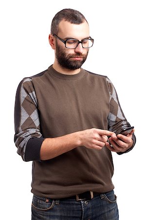 simsearch:400-06769983,k - Portrait of young man with beard holding cell phone Foto de stock - Royalty-Free Super Valor e Assinatura, Número: 400-06638803