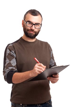 simsearch:400-06769983,k - Portrait of a young man writing on a clipboard Foto de stock - Royalty-Free Super Valor e Assinatura, Número: 400-06638811