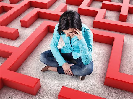 simsearch:400-06567183,k - Sad girl sits in a labyrinth with red walls Stock Photo - Budget Royalty-Free & Subscription, Code: 400-06638982