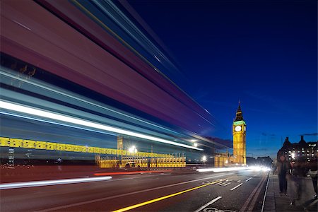 simsearch:841-07081325,k - Big Ben in the evening. Dabldekker passes and leaves a line of light at slow shutter speeds. Photograph taken with the tilt-shift lens, vertical lines of architecture preserved Foto de stock - Super Valor sin royalties y Suscripción, Código: 400-06639226