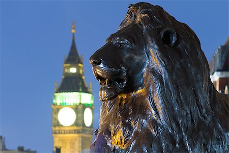 simsearch:400-05071700,k - Lion sculpture at Nelson's Column Memorial, Trafalgar Square with Big Ben in the background. London, UK Stock Photo - Budget Royalty-Free & Subscription, Code: 400-06639356