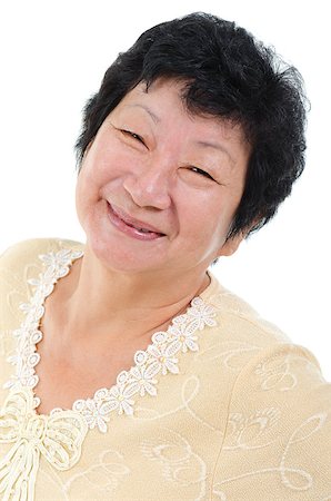 elderly asian faces - Happy 60s Asian Senior Woman on white background Stock Photo - Budget Royalty-Free & Subscription, Code: 400-06639654