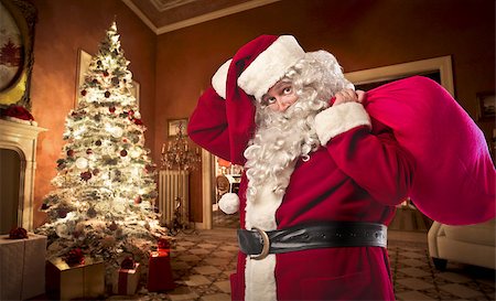 santa night - Santa Claus in a house with his sack Stock Photo - Budget Royalty-Free & Subscription, Code: 400-06639894