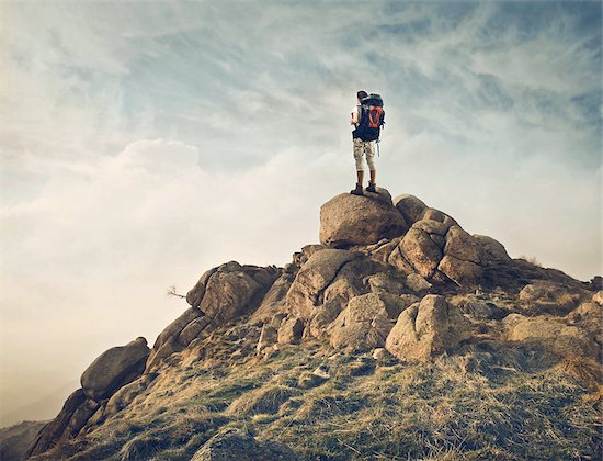 Young traveler standing on the top of a hill Stock Photo - Royalty-Free, Artist: Olly15, Image code: 400-06639915