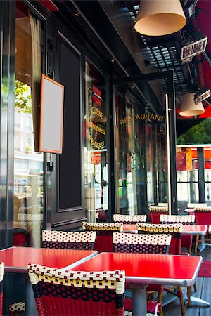 Street view of a coffee terrace with tables and chairs,paris France Stock Photo - Budget Royalty-Free & Subscription, Code: 400-06631249