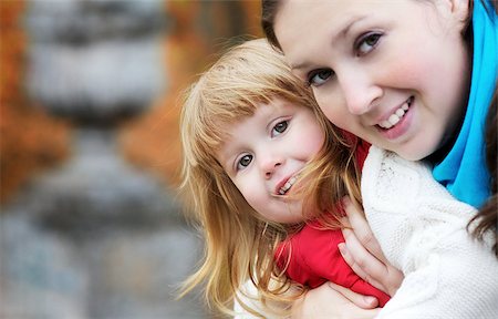 beautiful little girl and mother in autumn park Stock Photo - Budget Royalty-Free & Subscription, Code: 400-06631385