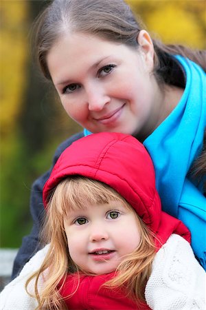beautiful little girl and mother in autumn park Stock Photo - Budget Royalty-Free & Subscription, Code: 400-06631386