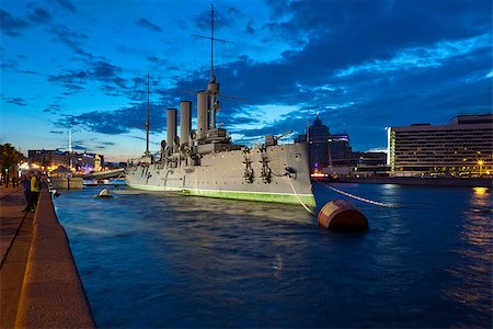 st petersburg night - The cruiser Aurora - a symbol of the October Revolution of 1917 in Russia, moored at the Petrograd embankment in St. Petersburg. Shooting in the white nights Stock Photo - Budget Royalty-Free & Subscription, Code: 400-06631391