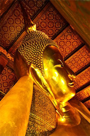 The Big golden Reclining Buddha within Wat Pho(also named wat po, wat phra chetuphon or Grand Palace) is the important in Bangkok, Thailand. Stock Photo - Budget Royalty-Free & Subscription, Code: 400-06631863