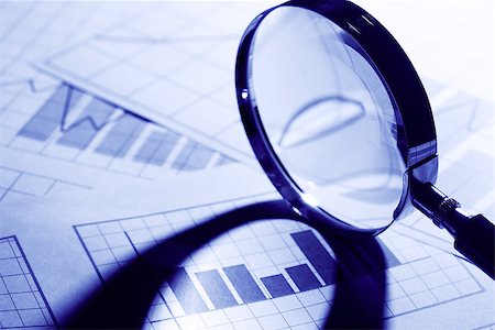 simsearch:400-06694744,k - Business concept. Magnifying glass on paper background with chart Fotografie stock - Microstock e Abbonamento, Codice: 400-06632000