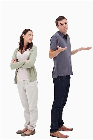 simsearch:400-08338944,k - Man shrugged his shoulders back to back with angry woman against white background Foto de stock - Super Valor sin royalties y Suscripción, Código: 400-06632404