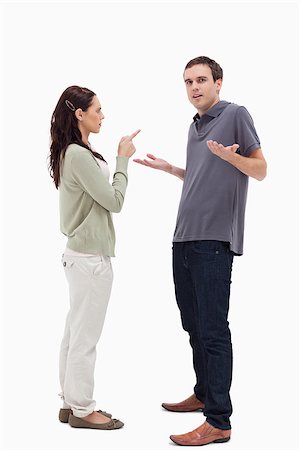 simsearch:400-08338944,k - Man shrugged his shoulders is scolded by woman against white background Stock Photo - Budget Royalty-Free & Subscription, Code: 400-06632402
