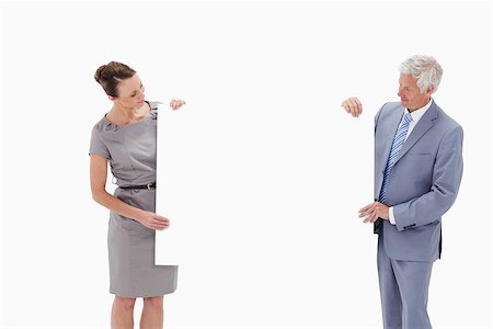 White hair businessman looking and holding a big white sign with a woman against white background Stock Photo - Budget Royalty-Free & Subscription, Code: 400-06632555