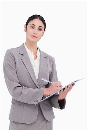 Businesswoman ready to take notes against a white background Stock Photo - Budget Royalty-Free & Subscription, Code: 400-06633119