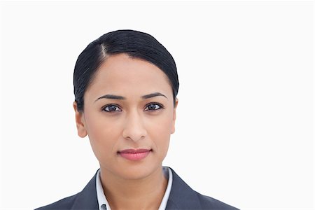simsearch:400-06633122,k - Close up of serious looking saleswoman against a white background Stock Photo - Budget Royalty-Free & Subscription, Code: 400-06633152