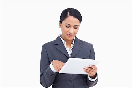sales person with a tablet - Close up of saleswoman with her touch screen computer against a white background Stock Photo - Budget Royalty-Free & Subscription, Code: 400-06633208