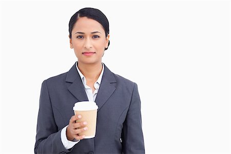 simsearch:400-06633122,k - Close up of saleswoman with paper cup against a white background Stock Photo - Budget Royalty-Free & Subscription, Code: 400-06633216