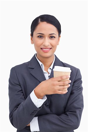 simsearch:400-06633122,k - Close up of smiling saleswoman and paper cup against a white background Stock Photo - Budget Royalty-Free & Subscription, Code: 400-06633218