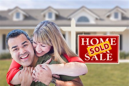 family with sold sign - Happy Mixed Race Couple in Front of Sold Real Estate Sign and New House. Stock Photo - Budget Royalty-Free & Subscription, Code: 400-06633891
