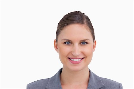 simsearch:400-06633122,k - Close up of smiling tradeswoman against a white background Stock Photo - Budget Royalty-Free & Subscription, Code: 400-06633927