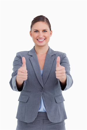 simsearch:400-05898224,k - Smiling tradeswoman giving her approval against a white background Foto de stock - Royalty-Free Super Valor e Assinatura, Número: 400-06633939