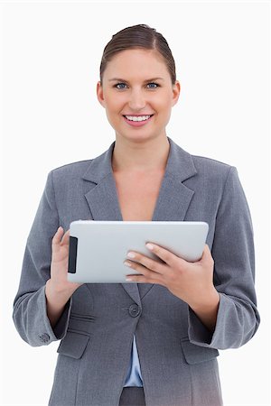 sales person with a tablet - Smiling tradeswoman with her touchscreen computer against a white background Stock Photo - Budget Royalty-Free & Subscription, Code: 400-06633952