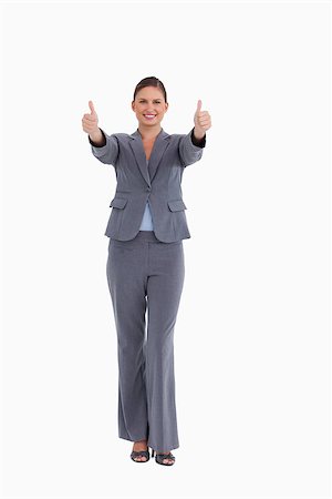 simsearch:400-05898224,k - Smiling tradeswoman giving thumbs up against a white background Foto de stock - Royalty-Free Super Valor e Assinatura, Número: 400-06633966