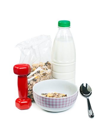 simsearch:400-04891088,k - Muesli breakfast in transparent package.Spoon, dumbbell and milk white isolated Stock Photo - Budget Royalty-Free & Subscription, Code: 400-06644002