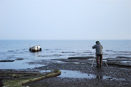 The photographer at the coast of the island oland in  sweden, Foto de stock - Super Valor sin royalties y Suscripción, Código: 400-06644820