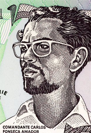 simsearch:400-06645344,k - Carlos Fonseca (1936-1976) on 50 Cordobas 1984 Banknote from Nicaragua. Nicaraguan teacher and librarian who founded the Sandinista National Liberation Front. Photographie de stock - Aubaine LD & Abonnement, Code: 400-06645313