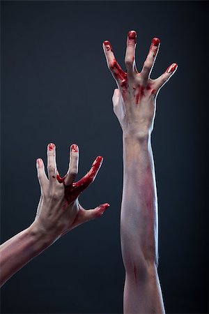 Zombie bloody hands, gray background Foto de stock - Super Valor sin royalties y Suscripción, Código: 400-06640110