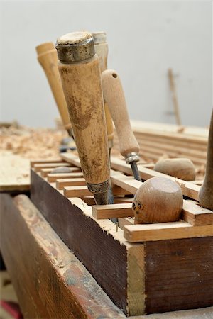 Some tools on a wooden desk at work Stock Photo - Budget Royalty-Free & Subscription, Code: 400-06640361
